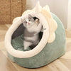 Adorable cat house with accompanying toy, providing a delightful retreat for your furry companion.